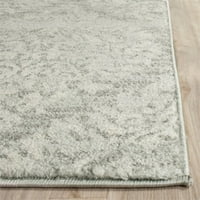 Съвременен килим в сиво и сребристо